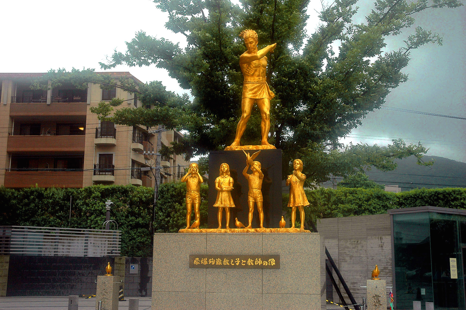 STATUE AT THE ENTRANCE TO THE NAGASAKI ATOMIC MUSEUM AND PEACE PARK