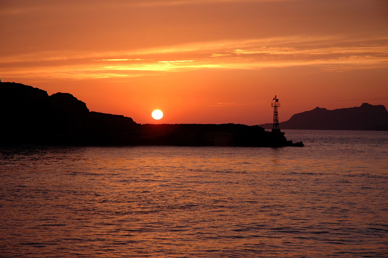 Website - A26 - Santorini-Setting Sun and Lighthouse
